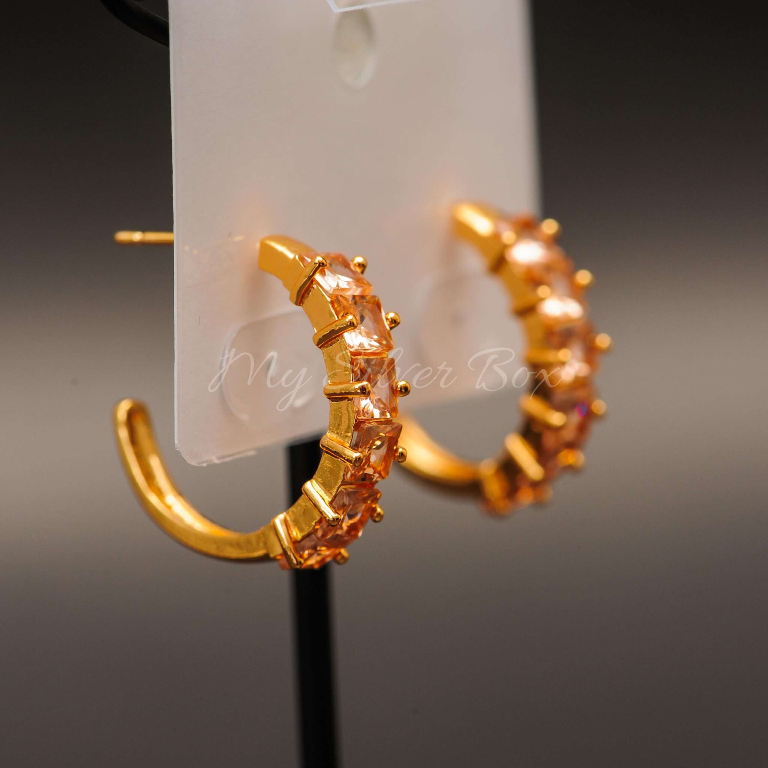 Loop earrings Gold with Champagne Zircon