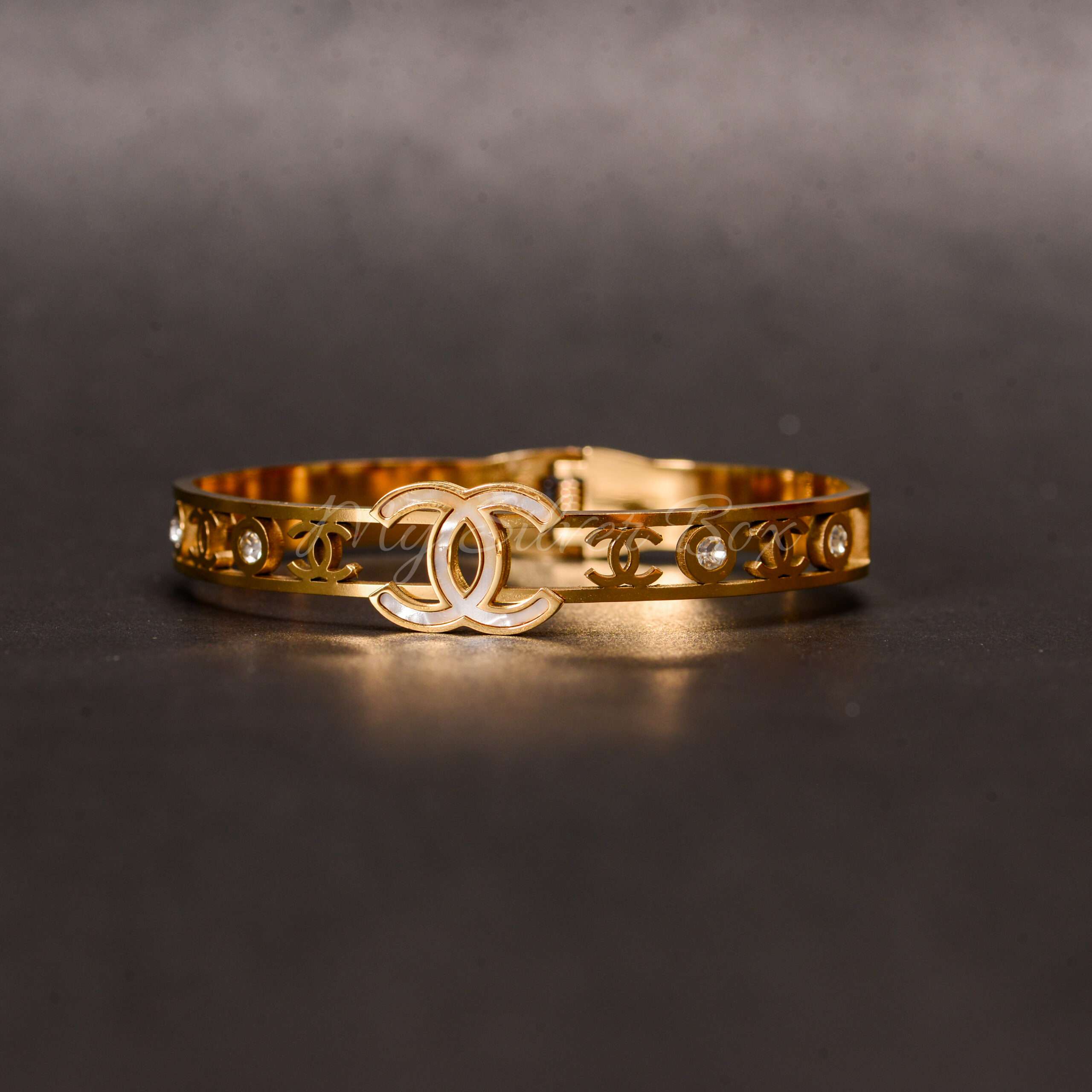 White Chanel Logo Bangle with American Diamonds