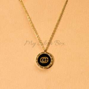Gucci Locket with Logo on Black Center
